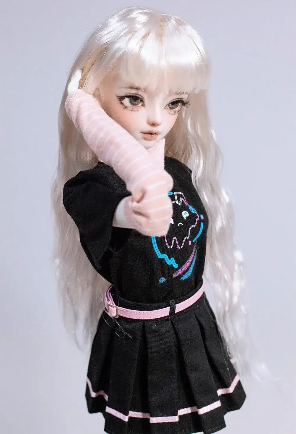 BJD doll in a black dress with a playful expression, showcasing a trendy outfit from the 1/4 Karawa Awa collection.