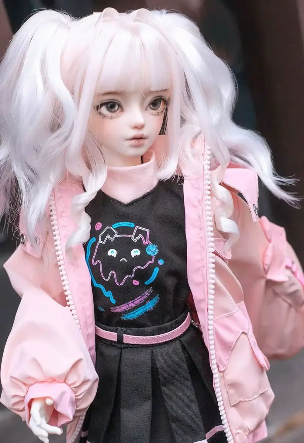 1/4 scale BJD doll wearing a pink jacket over a black shirt with a cute design, showcasing a fashionable outfit.